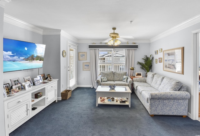 living room featuring dark colored carpet, ornamental molding, and ceiling fan