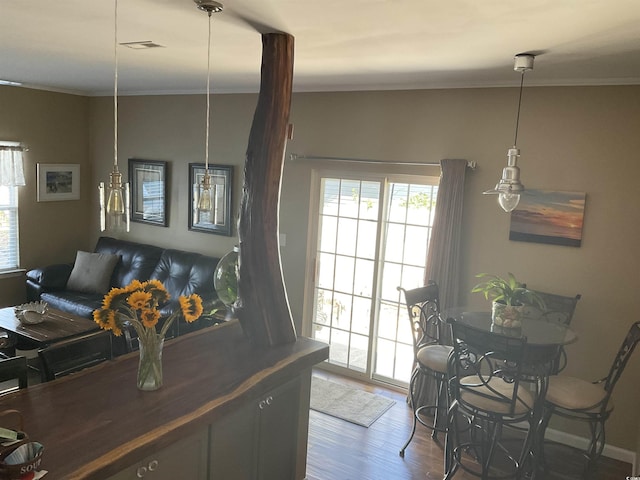 804 Brenda Pl, Myrtle Beach, SC 29577 - dining area with wood finished floors and ornamental molding