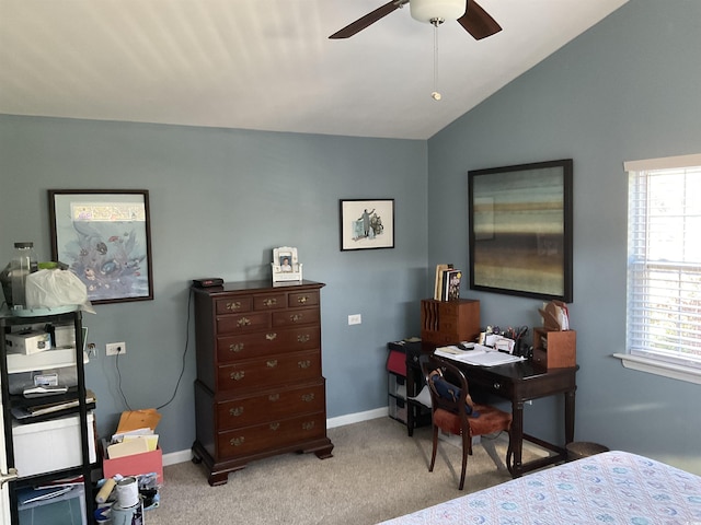 carpeted bedroom featuring ceiling fan and vaulted ceiling