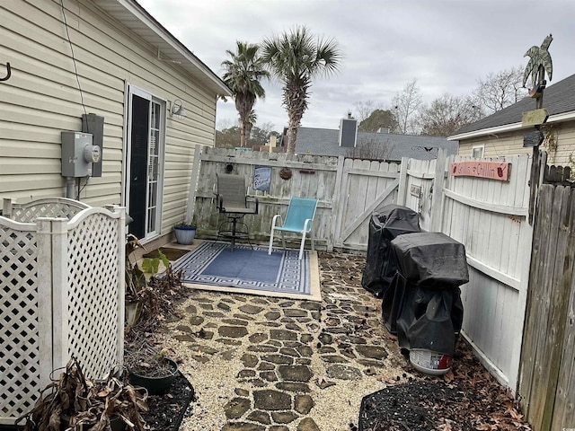 view of patio featuring a grill