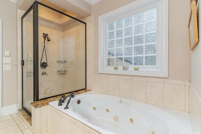 bathroom featuring plus walk in shower and tile patterned flooring