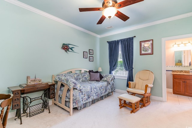 bedroom featuring ornamental molding, connected bathroom, light colored carpet, and ceiling fan