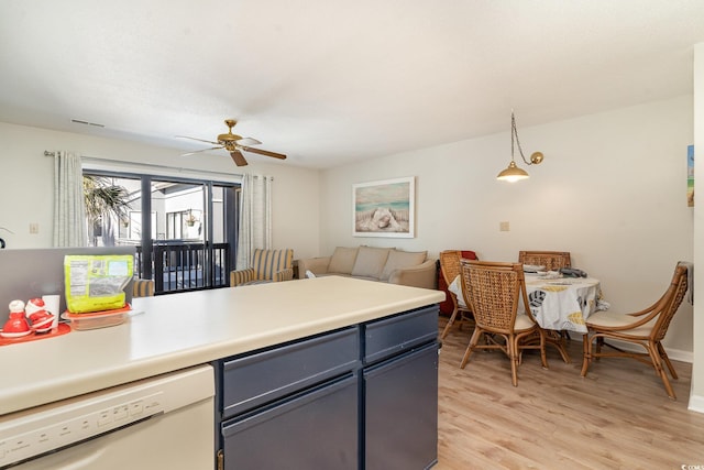 kitchen featuring dishwasher, pendant lighting, ceiling fan, and light hardwood / wood-style floors