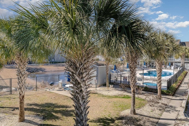 view of community with a swimming pool