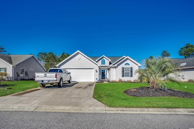 view of front facade with a garage and a front yard