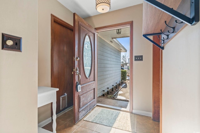 foyer featuring a healthy amount of sunlight and light tile patterned floors