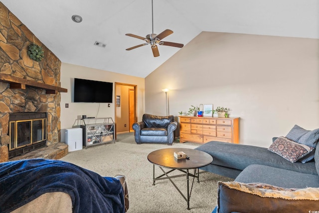 living room featuring a stone fireplace, high vaulted ceiling, ceiling fan, and carpet flooring