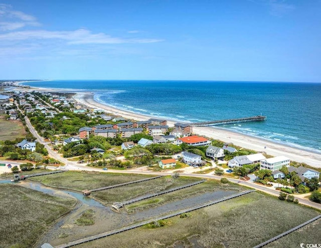 aerial view featuring a water view and a view of the beach