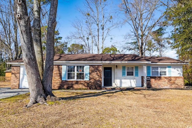 ranch-style house with a front yard