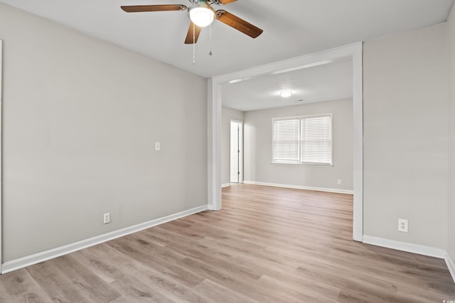 unfurnished room with light hardwood / wood-style flooring and ceiling fan