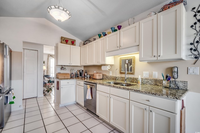 1579 Southwood Dr, Surfside Beach, SC 29575 - kitchen featuring dishwasher, a sink, white cabinetry, lofted ceiling, and light stone counters