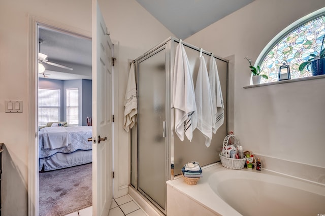 1579 Southwood Dr, Surfside Beach, SC 29575 - bathroom with ensuite bath, tile patterned floors, a shower stall, a bath, and a ceiling fan