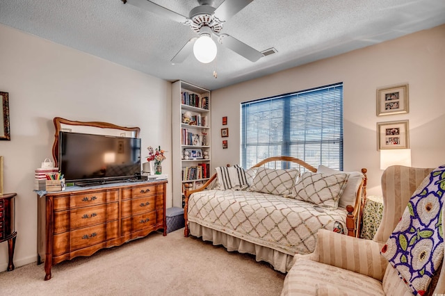 1579 Southwood Dr, Surfside Beach, SC 29575 - bedroom featuring light colored carpet, a textured ceiling, and ceiling fan