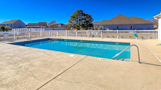 1579 Southwood Dr, Surfside Beach, SC 29575 - community pool with fence and a patio area