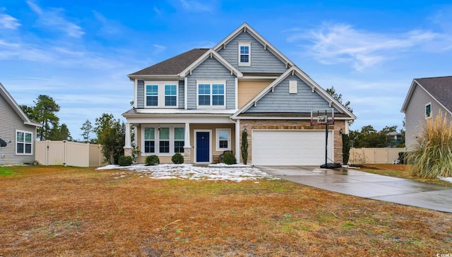 craftsman house featuring a porch and a front yard