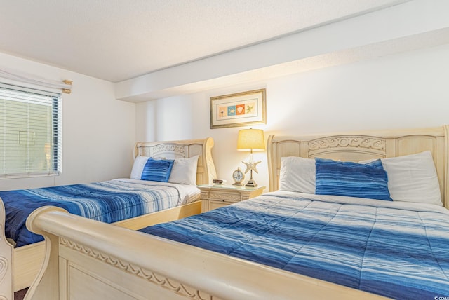 bedroom featuring a textured ceiling