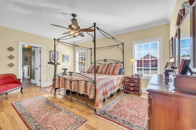 bedroom featuring ornamental molding and light hardwood / wood-style flooring