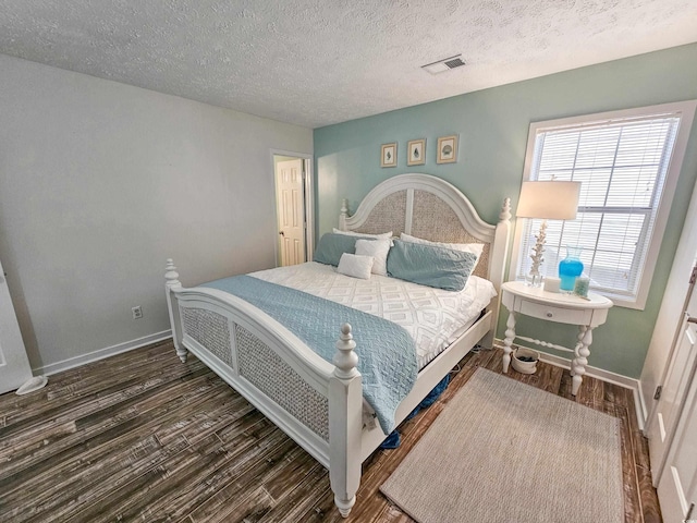 299 Lake Arrowhead Rd, Myrtle Beach, SC 29572 - bedroom featuring wood finished floors and a textured ceiling