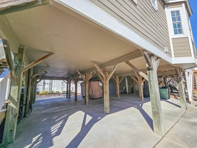 299 Lake Arrowhead Rd, Myrtle Beach, SC 29572 - view of patio / terrace with stairs and a carport