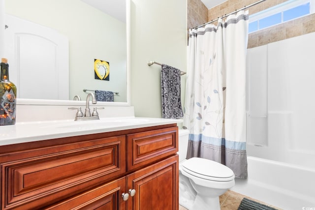 full bathroom with vanity, toilet, and shower / tub combo with curtain