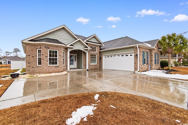 view of front of home with a garage