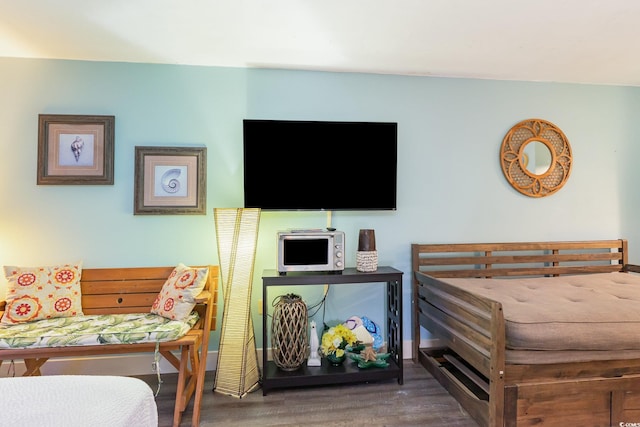 1501 S Ocean Blvd Unit 811, Myrtle Beach, SC 29577 - bedroom with baseboards and wood finished floors