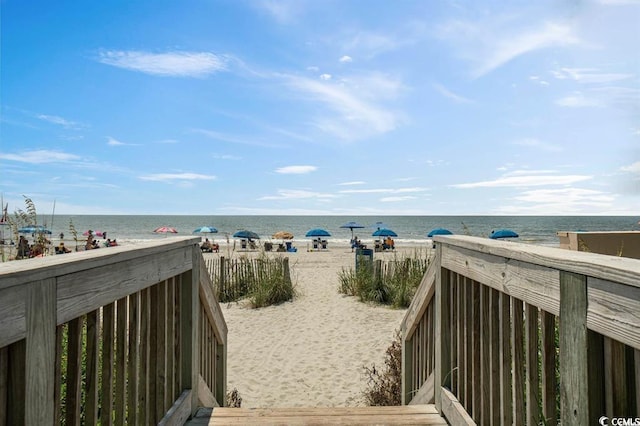 water view featuring a beach view