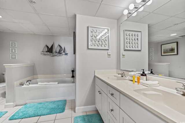 501 S Ocean Blvd Unit 505, North Myrtle Beach, SC 29582 - full bath featuring a paneled ceiling, tile patterned floors, double vanity, and a bath