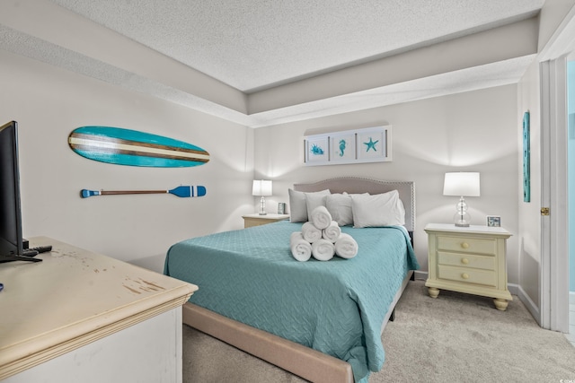 501 S Ocean Blvd Unit 505, North Myrtle Beach, SC 29582 - bedroom featuring light colored carpet and a textured ceiling