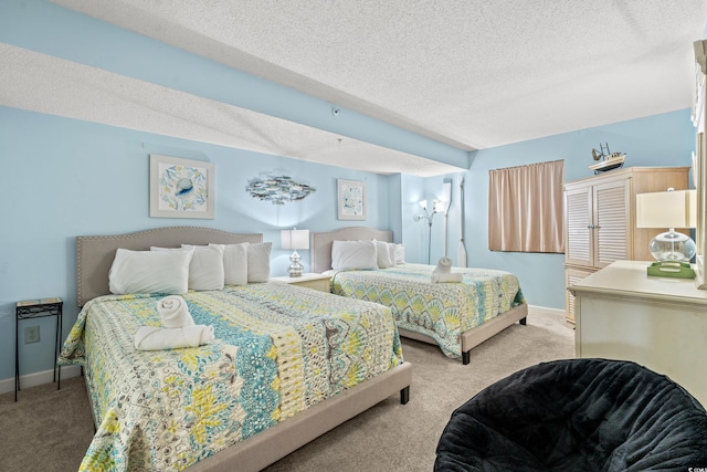 501 S Ocean Blvd Unit 505, North Myrtle Beach, SC 29582 - bedroom featuring light carpet and a textured ceiling