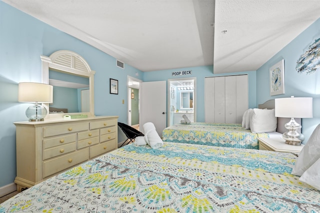 501 S Ocean Blvd Unit 505, North Myrtle Beach, SC 29582 - bedroom featuring ensuite bathroom and a closet