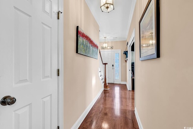 637 Sparrow Dr, Surfside Beach, SC 29575 - corridor featuring baseboards, stairs, crown molding, and wood finished floors