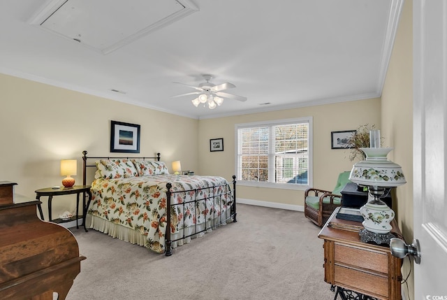 carpeted bedroom with ornamental molding and ceiling fan