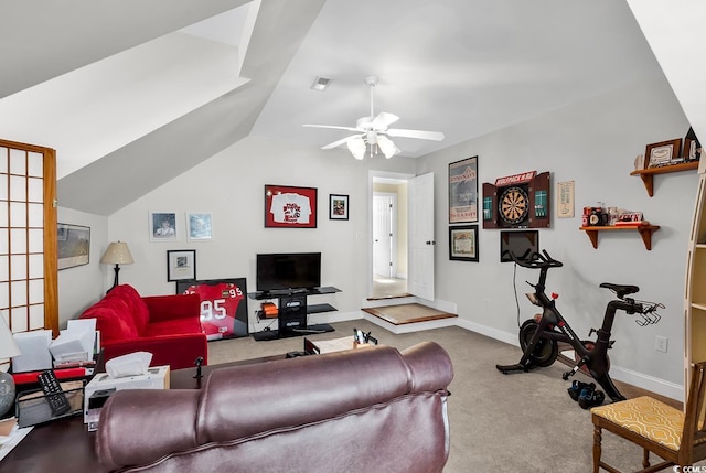 carpeted living room with vaulted ceiling and ceiling fan