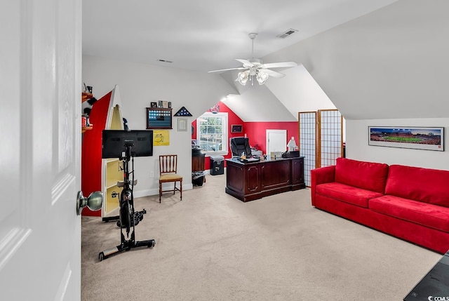 office area featuring vaulted ceiling, ceiling fan, and carpet floors