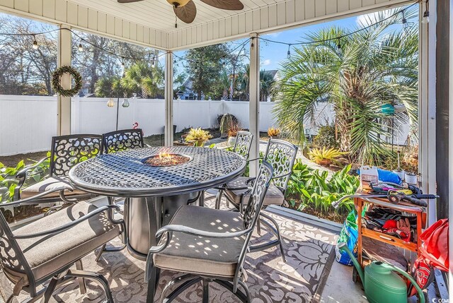 637 Sparrow Dr, Surfside Beach, SC 29575 - sunroom with outdoor dining area and ceiling fan