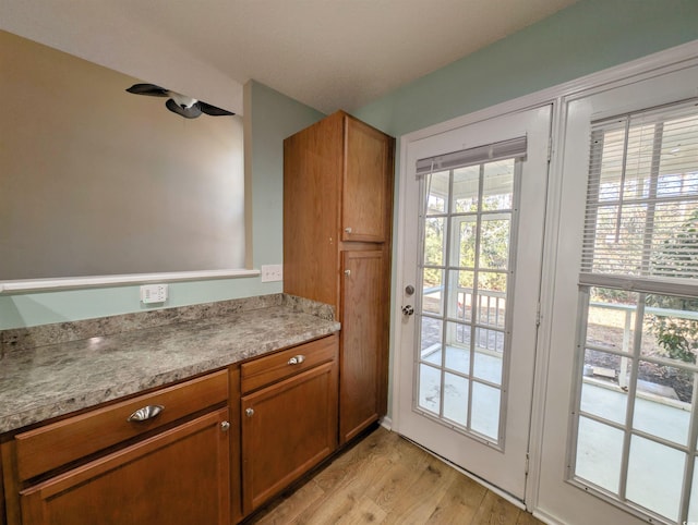 entryway featuring light wood-style flooring