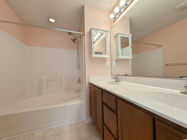 bathroom featuring tile patterned floors, a sink, a textured ceiling, and shower / bathtub combination