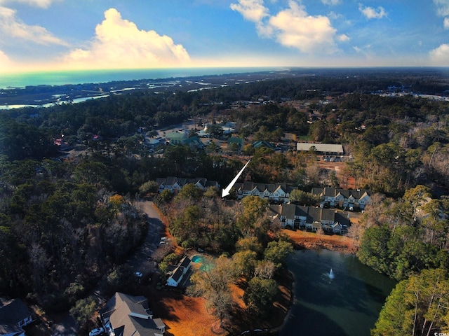 aerial view at dusk featuring a residential view