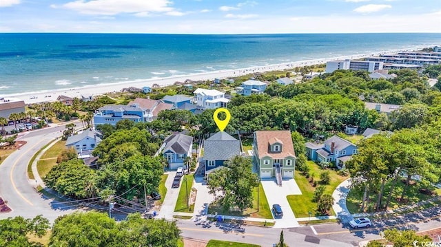 aerial view featuring a water view and a beach view