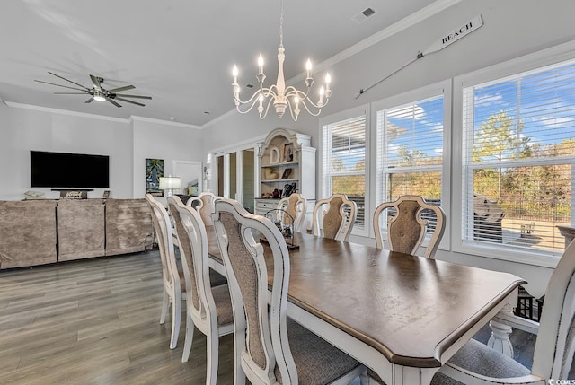 980 Desert Wheatgrass Dr, Myrtle Beach, SC 29579 - dining space featuring ornamental molding, visible vents, light wood-type flooring, and ceiling fan with notable chandelier