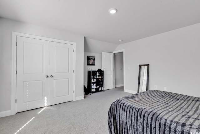 980 Desert Wheatgrass Dr, Myrtle Beach, SC 29579 - bedroom with vaulted ceiling, light colored carpet, baseboards, and a closet