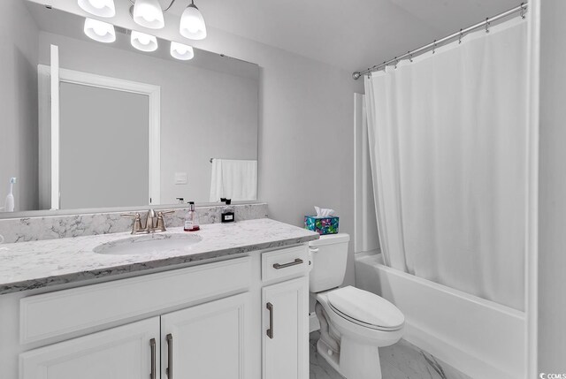 full bathroom featuring vanity, shower / bath combination with curtain, and toilet