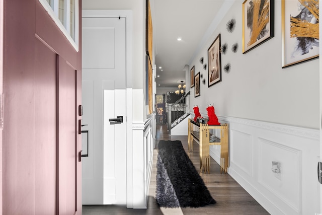 hallway with dark hardwood / wood-style flooring