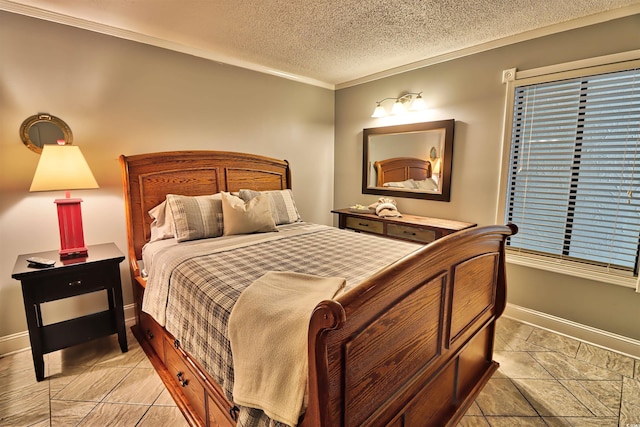 bedroom with a textured ceiling, baseboards, and crown molding