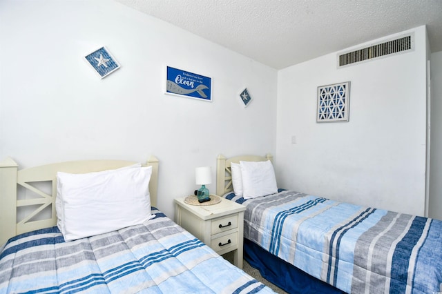 bedroom with a textured ceiling