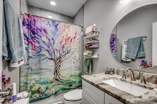 full bathroom featuring vanity, shower / bathtub combination with curtain, and toilet