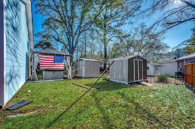 view of yard featuring a storage shed