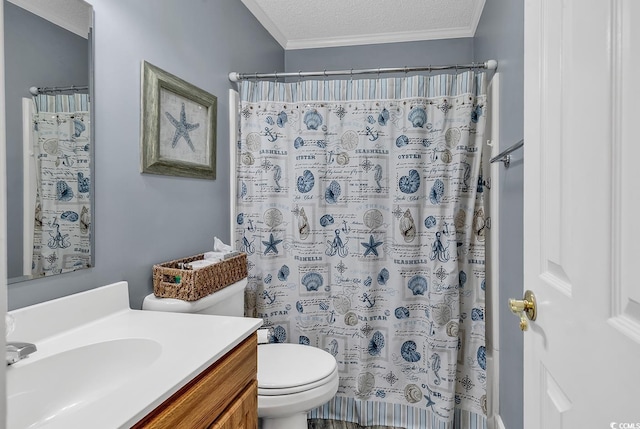 bathroom with crown molding, vanity, a textured ceiling, and toilet