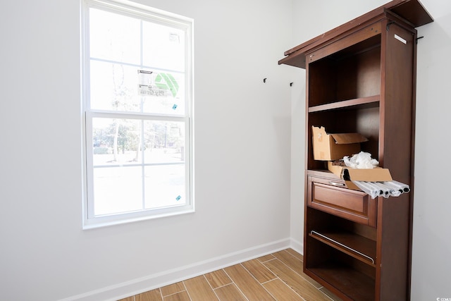 mudroom with light hardwood / wood-style floors